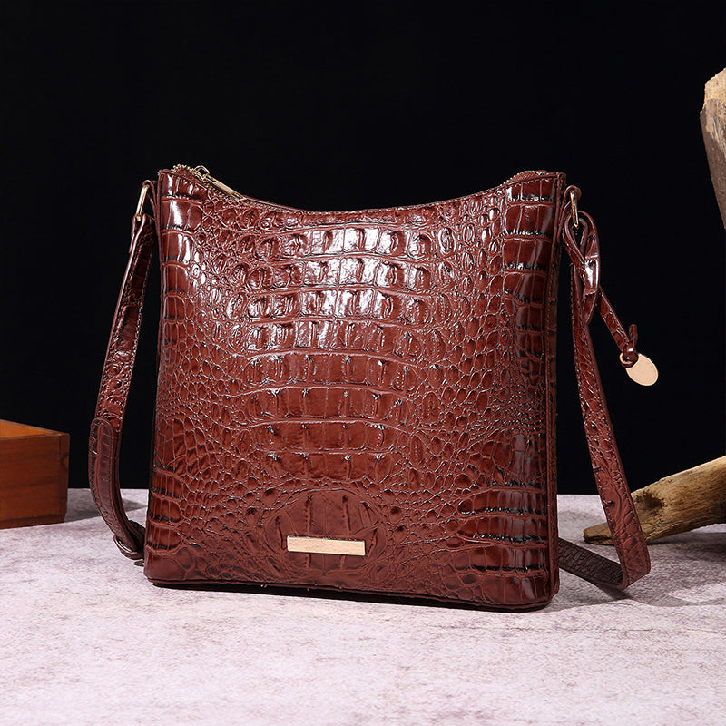 Women's elegant crossbody bag made of crocodile embossed leather