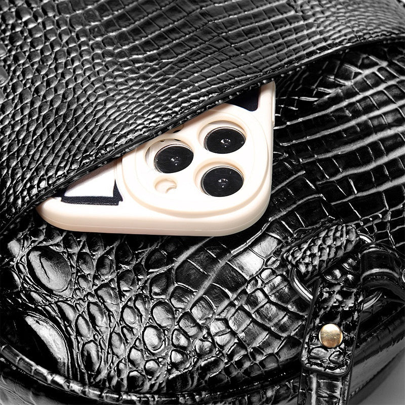 Trendy backpack made of PU leather with crocodile embossing
