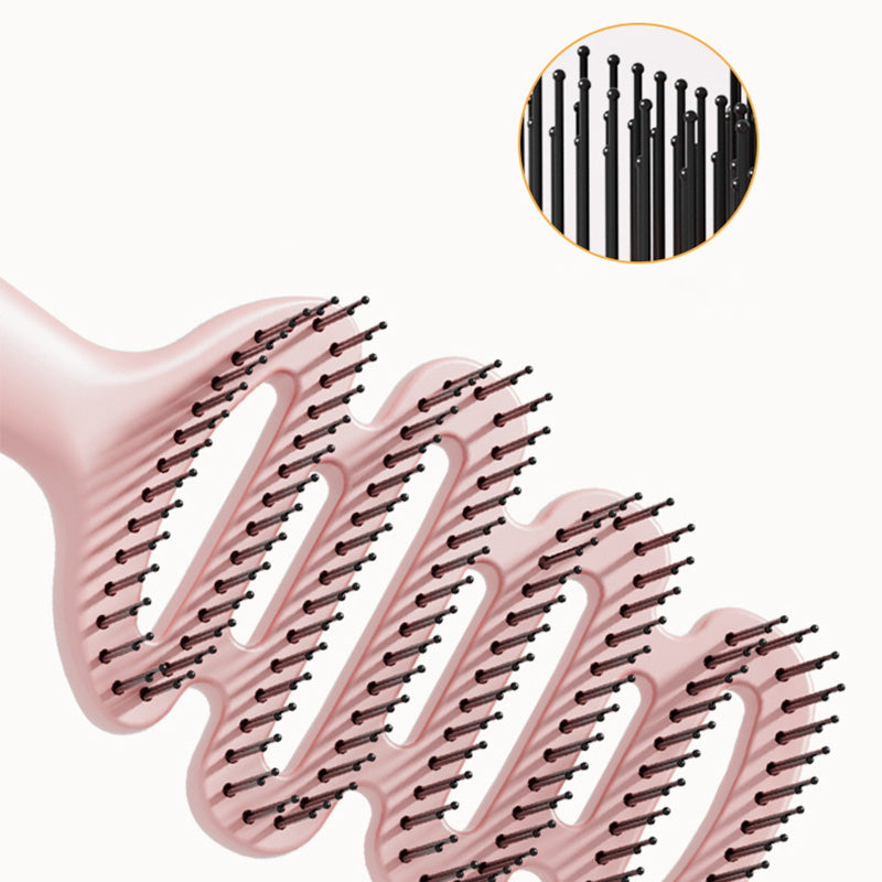 Cepillo de pelo con ventilación curva