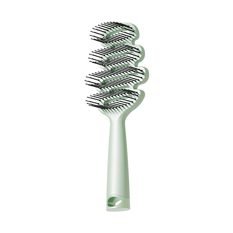 Cepillo de pelo con ventilación curva