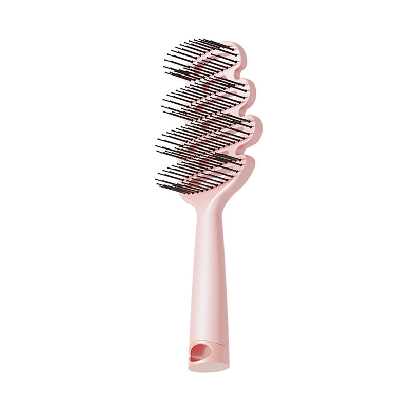 Cepillo de pelo con ventilación curva