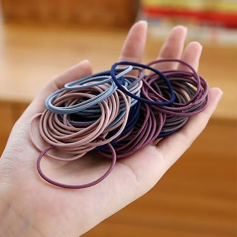 100 coleteros elásticos para el pelo en frasco