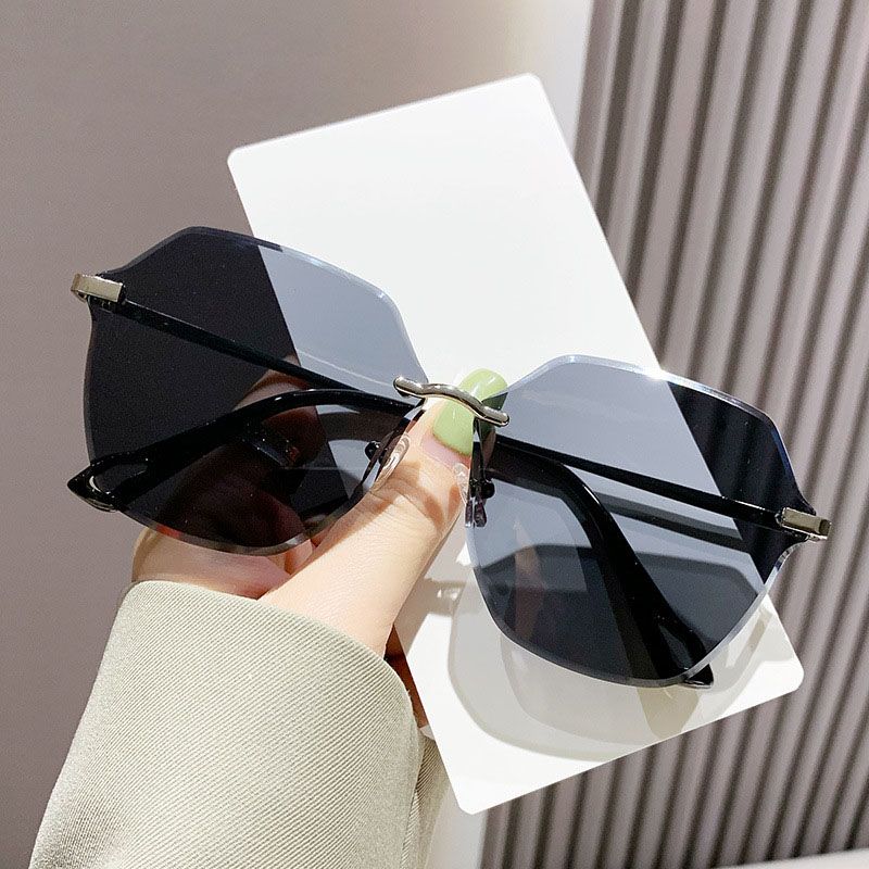 Gafas de sol polarizadas sin montura con protección UV a la moda