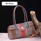 Fashionable vintage ladies handbag with crocodile embossing made of PU leather
