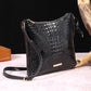 Women's elegant crossbody bag made of crocodile embossed leather