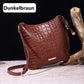 Women's elegant crossbody bag made of crocodile embossed leather