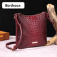 Women's elegant crossbody bag made of crocodile embossed leather