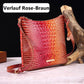 Women's elegant crossbody bag made of crocodile embossed leather