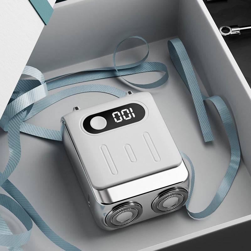 Mini afeitadora eléctrica rotativa portátil para hombre
