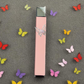 Encendedor de butano recargable con acento decorativo de mariposa