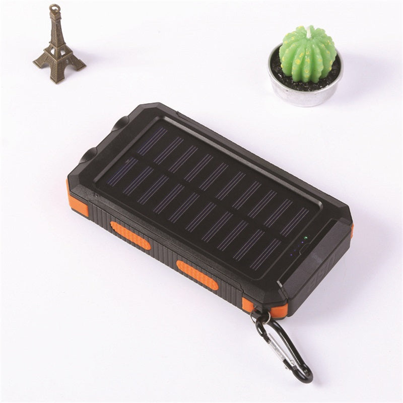 Banco de Energía Portátil de 20000mAh con Cargador Solar y Linterna LED.