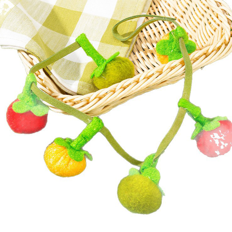Hilo interactivo de juguete con hierba gatera en forma de fruta