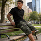 Pantalones cortos cargo de camuflaje masculino con múltiples bolsillos